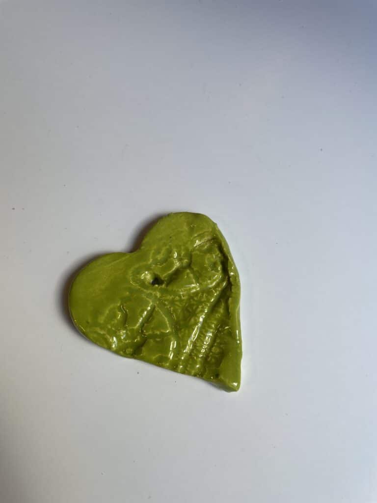 Een foto van groen decoratief hartje