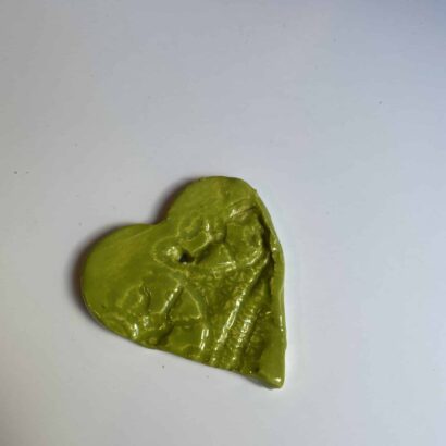 Een foto van groen decoratief hartje